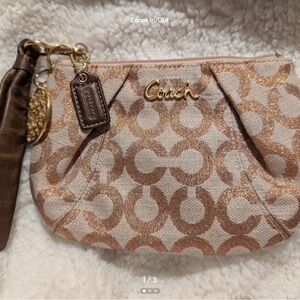 Coach op art lurex wristlet in metallic rose gold and bronze